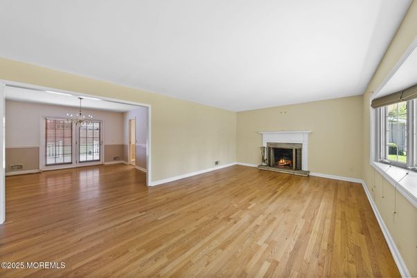 Empty room, Fireplace, Interior, Pendant Lights, Wood Texture Flooring
