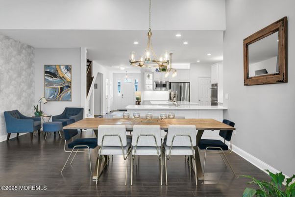 Chandelier, Dining room, Interior, Kitchen, Pendant Lights, Recessed Lighting, Stainless Steel Appliances, Wood Texture Flooring