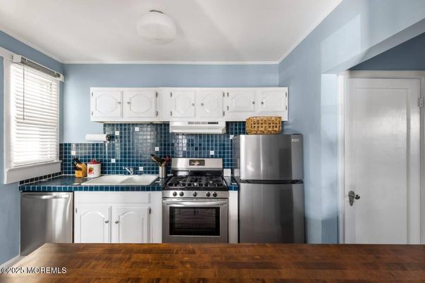 Interior, Kitchen, Stainless Steel Appliances, Tile Countertops