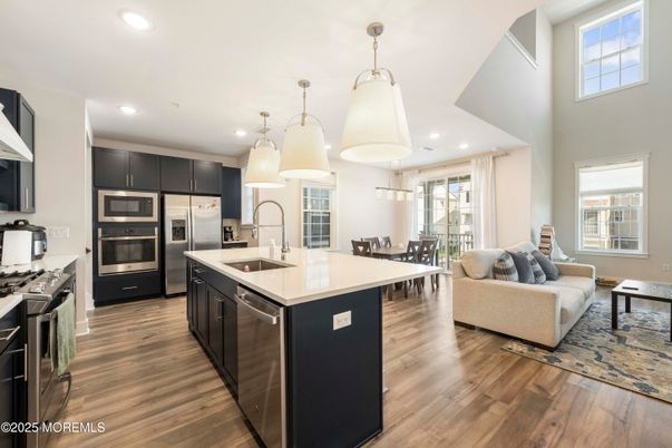 Dining room, Interior, Kitchen, Living room, Pendant Lights, Recessed Lighting, Stainless Steel Appliances, Wood Texture Flooring