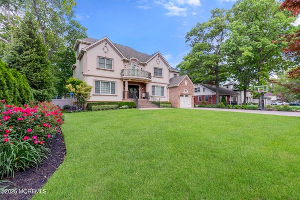 Attached, Backyard, Exterior, Facade, Brick Facade, Tudor Revival
