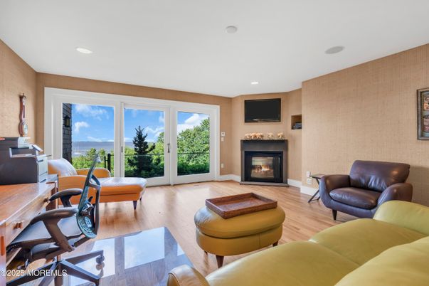 Fireplace, Home Office, Interior, Recessed Lighting, Water, Wood Texture Flooring