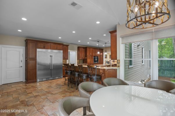 Chandelier, Dining room, Interior, Kitchen, Pendant Lights, Recessed Lighting, Stainless Steel Appliances