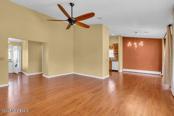 Chandelier, Empty room, Interior, Recessed Lighting, Wood Texture Flooring
