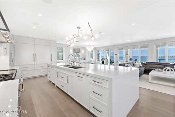 Chandelier, Interior, Kitchen, Living room, Recessed Lighting, Water, Wood Texture Flooring