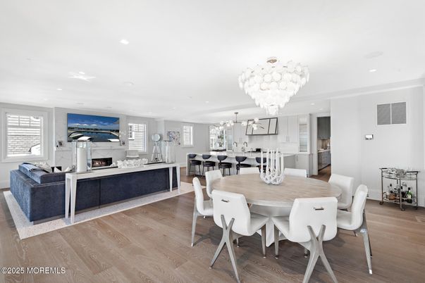 Chandelier, Dining room, Fireplace, Interior, Kitchen, Living room, Recessed Lighting, Wood Texture Flooring