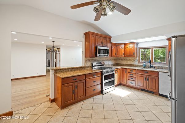 Chandelier, Interior, Kitchen, Recessed Lighting, Stainless Steel Appliances, Wood Texture Flooring