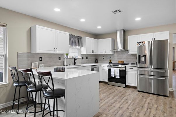 Interior, Kitchen, Recessed Lighting, Stainless Steel Appliances, Wood Texture Flooring