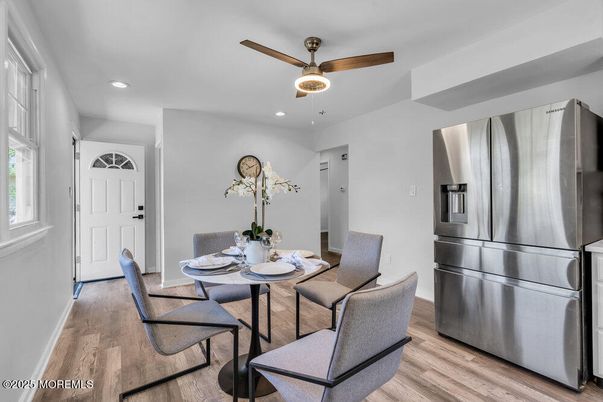 Dining room, Interior, Kitchen, Recessed Lighting, Stainless Steel Appliances, Wood Texture Flooring
