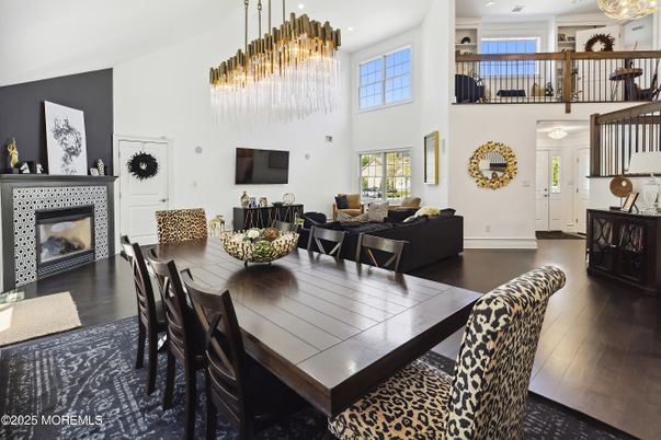Dining room, Fireplace, Interior, Living room, Pendant Lights, Recessed Lighting, Wood Texture Flooring