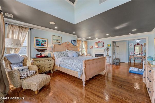 Bedroom, Fireplace, Interior, Recessed Lighting, Wood Texture Flooring