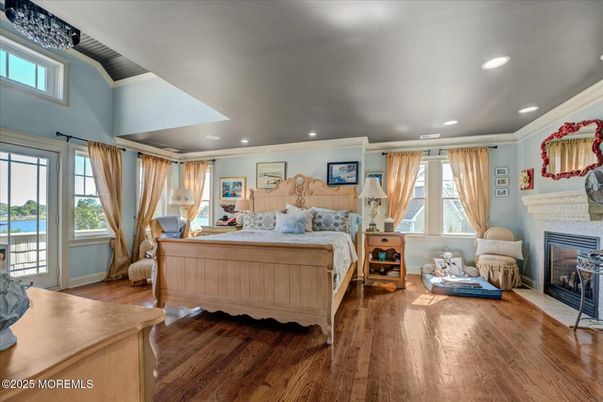 Bedroom, Fireplace, Interior, Recessed Lighting, Wood Texture Flooring