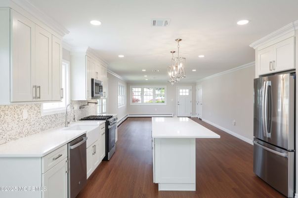 Chandelier, Interior, Kitchen, Pendant Lights, Recessed Lighting, Stainless Steel Appliances, Wood Texture Flooring