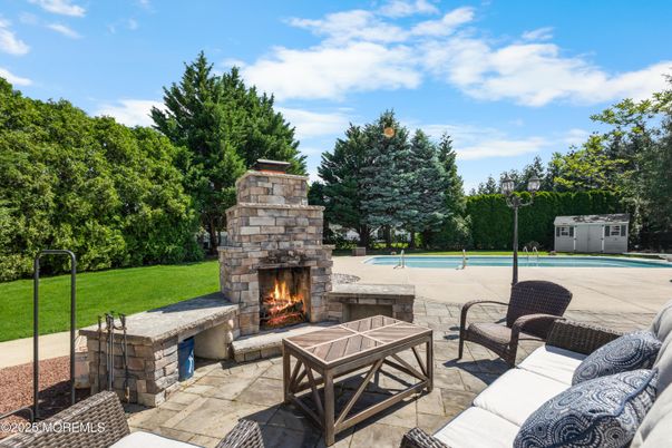 Exterior, Fireplace, Pool