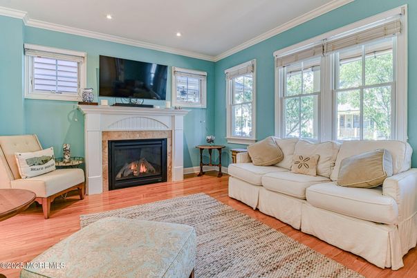 Fireplace, Interior, Living room, Recessed Lighting, Wood Texture Flooring