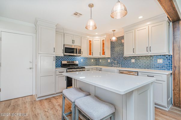 Interior, Kitchen, Pendant Lights, Recessed Lighting, Stainless Steel Appliances, Wood Texture Flooring