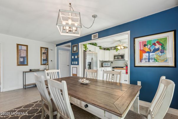 Dining room, Interior, Kitchen, Pendant Lights, Stainless Steel Appliances, Wood Texture Flooring