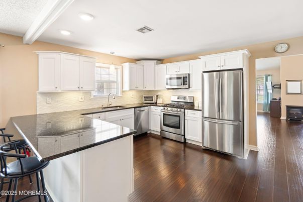Interior, Kitchen, Recessed Lighting, Stainless Steel Appliances, Wood Texture Flooring