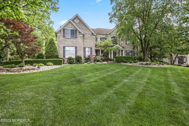 Attached, Backyard, Exterior, Facade, Brick Facade, Tudor Revival