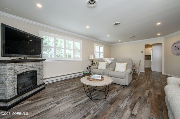 Fireplace, Interior, Living room, Recessed Lighting, Wood Texture Flooring