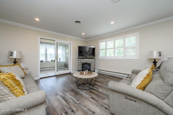 Fireplace, Interior, Living room, Recessed Lighting, Wood Texture Flooring