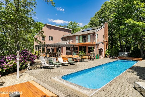 Exterior, Pool, Solar Panels