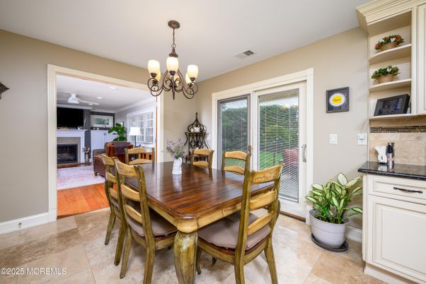 Chandelier, Dining room, Fireplace, Interior, Recessed Lighting