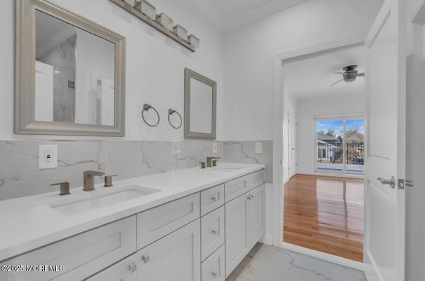 Bathroom, Dual Sink Vanities, Interior, Marble, Marble Walls, Wood Texture Flooring