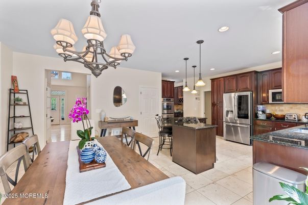 Chandelier, Dining room, Interior, Kitchen, Pendant Lights, Recessed Lighting, Stainless Steel Appliances