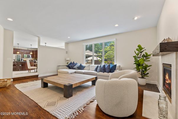 Dining room, Fireplace, Interior, Living room, Pendant Lights, Recessed Lighting, Wood Texture Flooring
