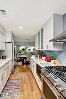 Dining room, Interior, Kitchen, Recessed Lighting, Stainless Steel Appliances, Wood Texture Flooring