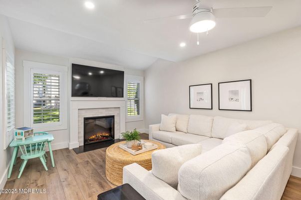 Fireplace, Interior, Living room, Recessed Lighting, Wood Texture Flooring