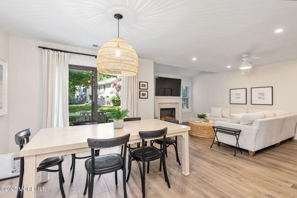 Dining room, Fireplace, Interior, Living room, Pendant Lights, Recessed Lighting, Wood Texture Flooring