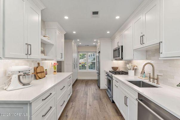 Interior, Kitchen, Recessed Lighting, Stainless Steel Appliances, Wood Texture Flooring