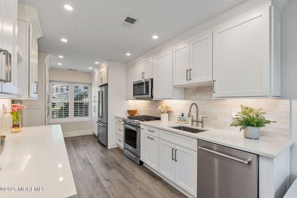 Interior, Kitchen, Recessed Lighting, Stainless Steel Appliances, Wood Texture Flooring