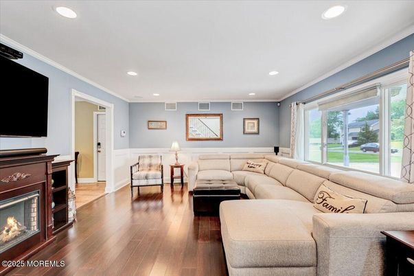 Fireplace, Interior, Living room, Recessed Lighting, Wood Texture Flooring