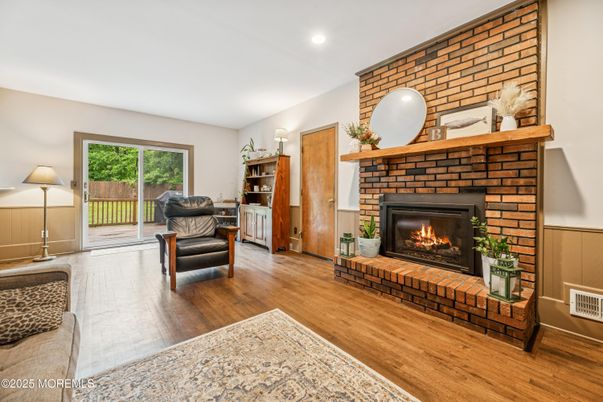 Fireplace, Interior, Recessed Lighting, Stone Walls, Wood Texture Flooring
