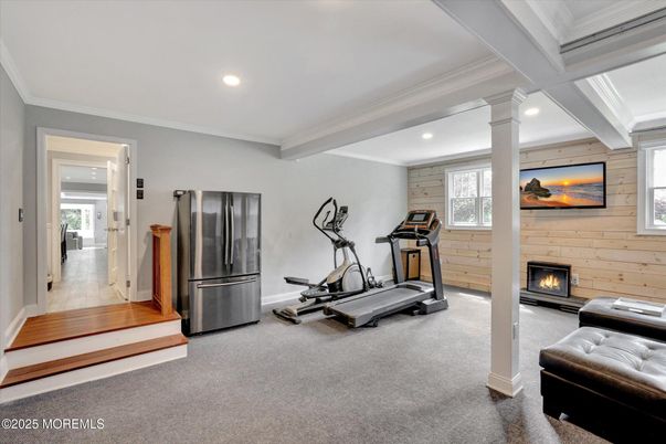 Fireplace, Fitness Equipment, Interior, Recessed Lighting, Wood Texture Flooring