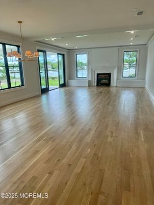 Empty room, Fireplace, Interior, Pendant Lights, Recessed Lighting, Wood Texture Flooring
