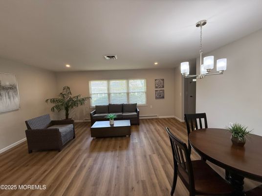 Chandelier, Dining room, Interior, Living room, Recessed Lighting, Wood Texture Flooring