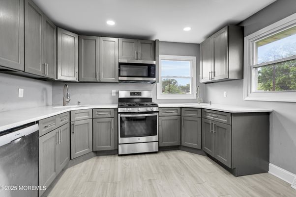 Interior, Kitchen, Recessed Lighting, Stainless Steel Appliances, Wood Texture Flooring