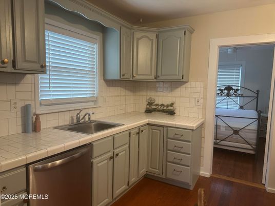 Interior, Kitchen, Tile Countertops, Wood Texture Flooring
