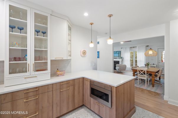 Dining room, Fireplace, Interior, Kitchen, Pendant Lights, Recessed Lighting, Wood Texture Flooring