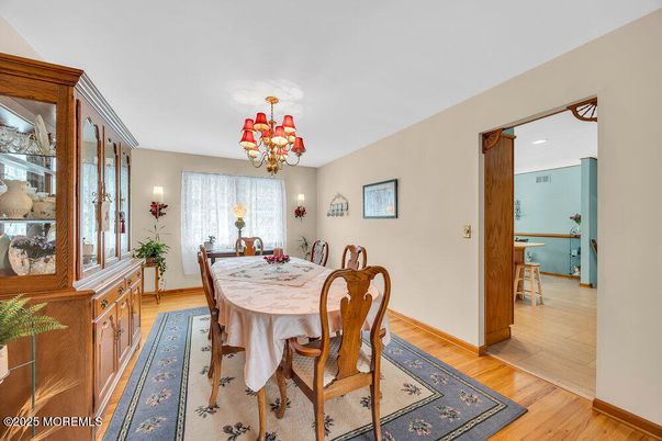 Chandelier, Dining room, Interior, Wood Texture Flooring
