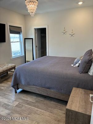 Bedroom, Chandelier, Interior, Recessed Lighting, Wood Texture Flooring