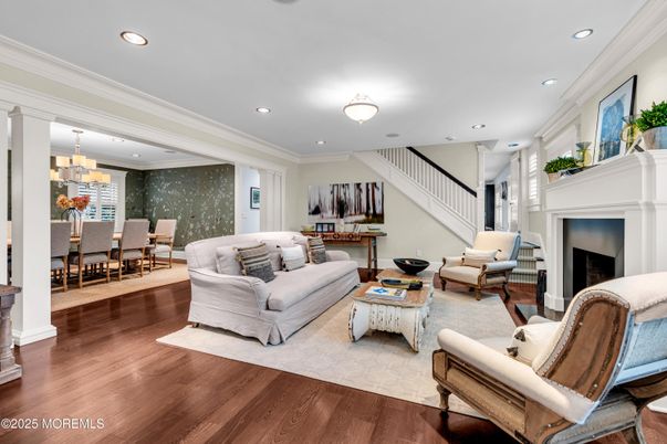 Chandelier, Dining room, Fireplace, Interior, Living room, Recessed Lighting, Wood Texture Flooring