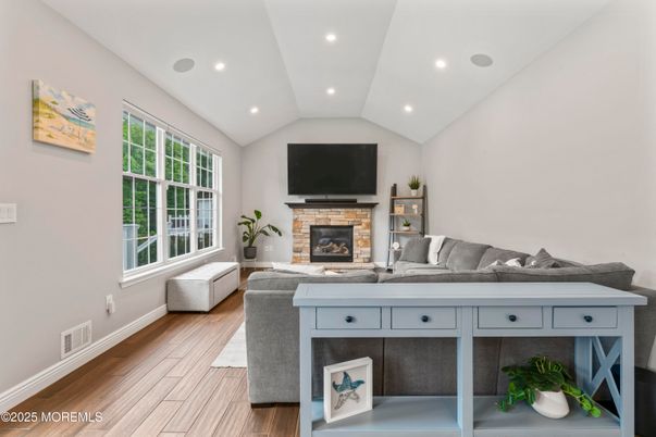Fireplace, Interior, Living room, Recessed Lighting, Wood Texture Flooring