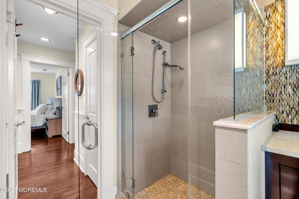 Bathroom, Bedroom, Glass Shower, Interior, Recessed Lighting, Wood Texture Flooring