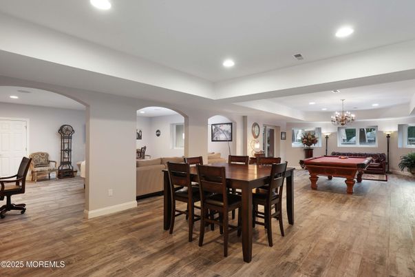 Billiard Table, Chandelier, Dining room, Game Room, Interior, Recessed Lighting, Wood Texture Flooring