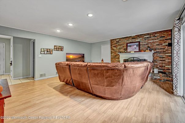Interior, Living room, Recessed Lighting, Stone Walls, Wood Texture Flooring